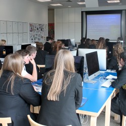 Notley at the Education Centre getting instructions